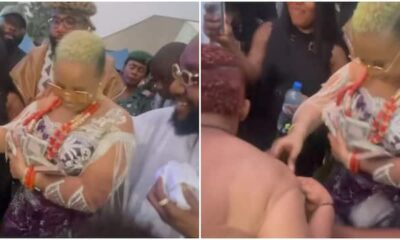 Thunder Fire Poverty: Reactions As E-Money’s Wife Sprays Kcee’s Woman With Bundles of Money on Dancefloor