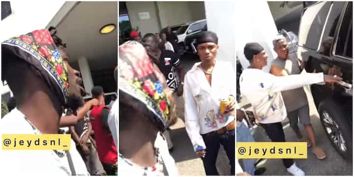 One Love Go Sing for Them Wizkid Hops Into His Car As Upcoming Artiste Tries to Impress Him in Video